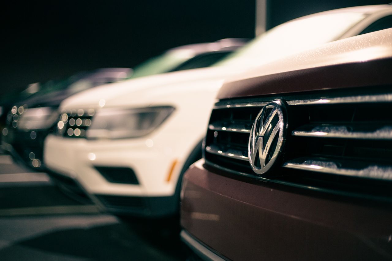The Art of Drawing Readers In: Your attractive post title goes here Front bumpers of expensive prestige automobiles at market retailing new cars at night